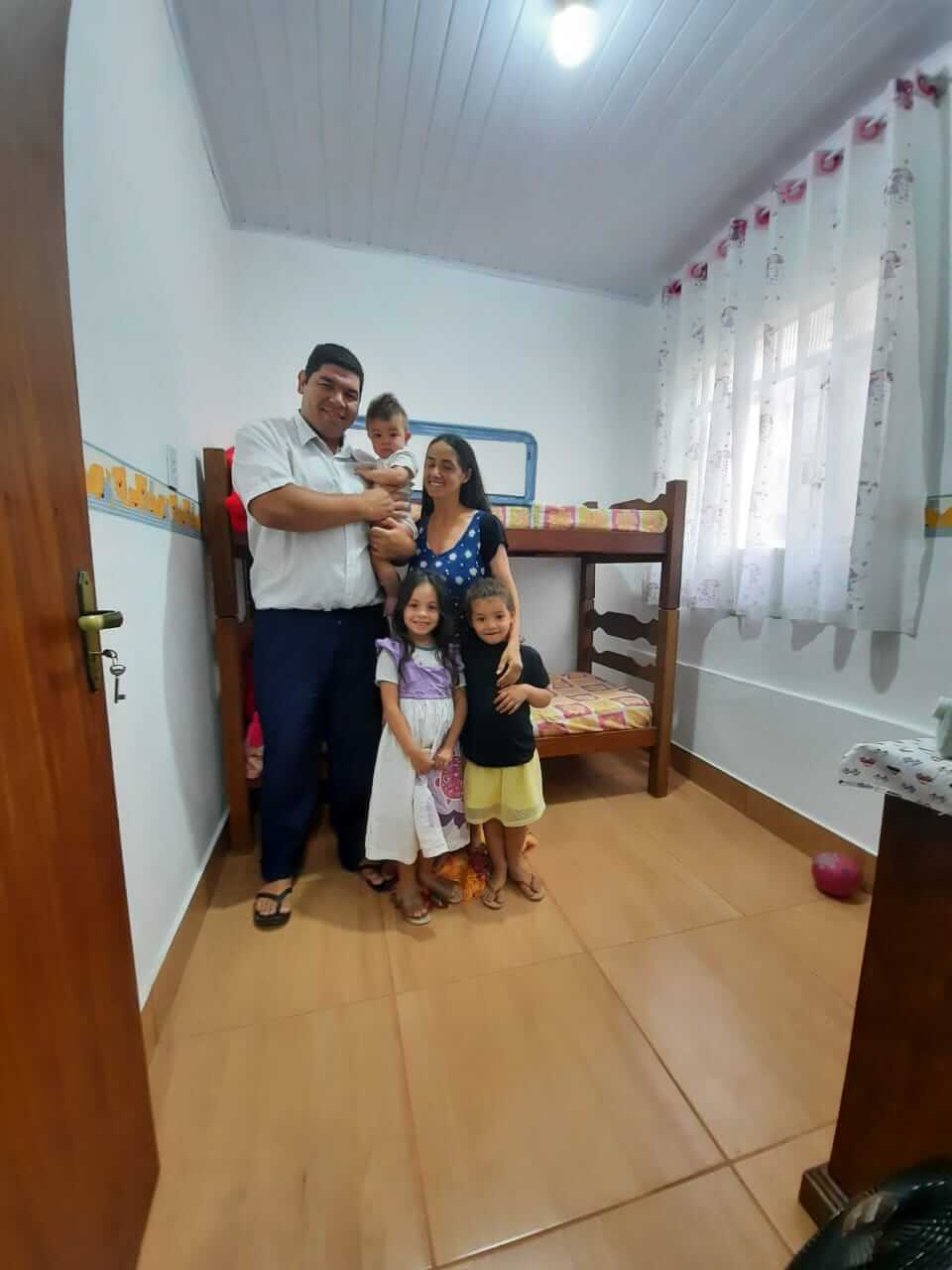 Família Feliz com a Reforma do Arquitetas Nômades